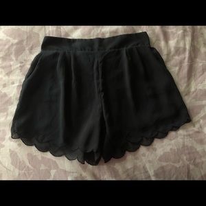 Black scalloped shorts